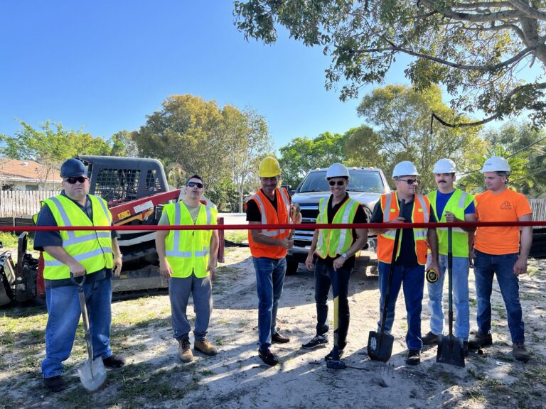 Construction crew at the 1313 full home rebuild ribbon cutting